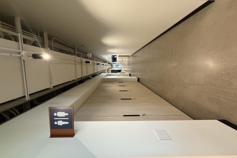 Custom laminate service counter with integrated workstations built by Castaldi Custom